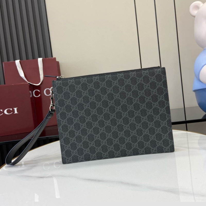 G*u*i clutch bags